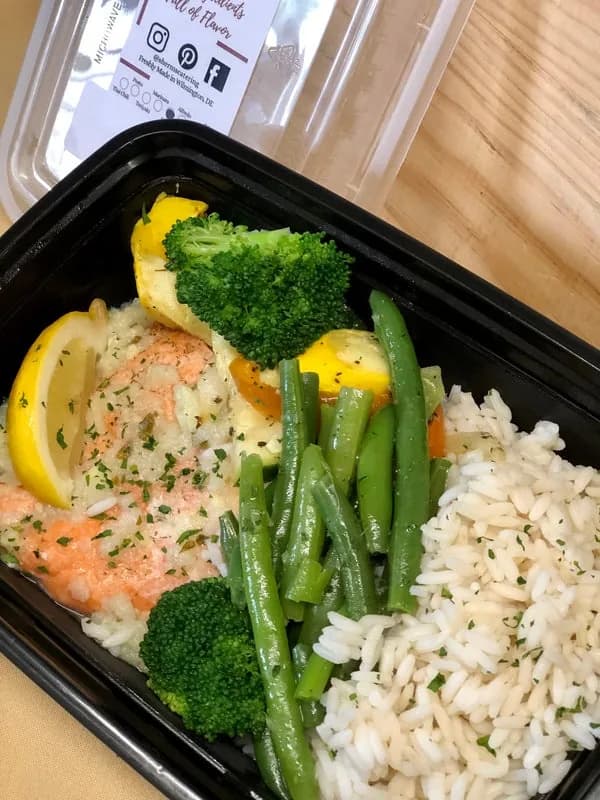 Sherm's Heat & Eat individual office lunch — lemon garlic salmon with rice, broccoli and green beans in a ready-to-heat container